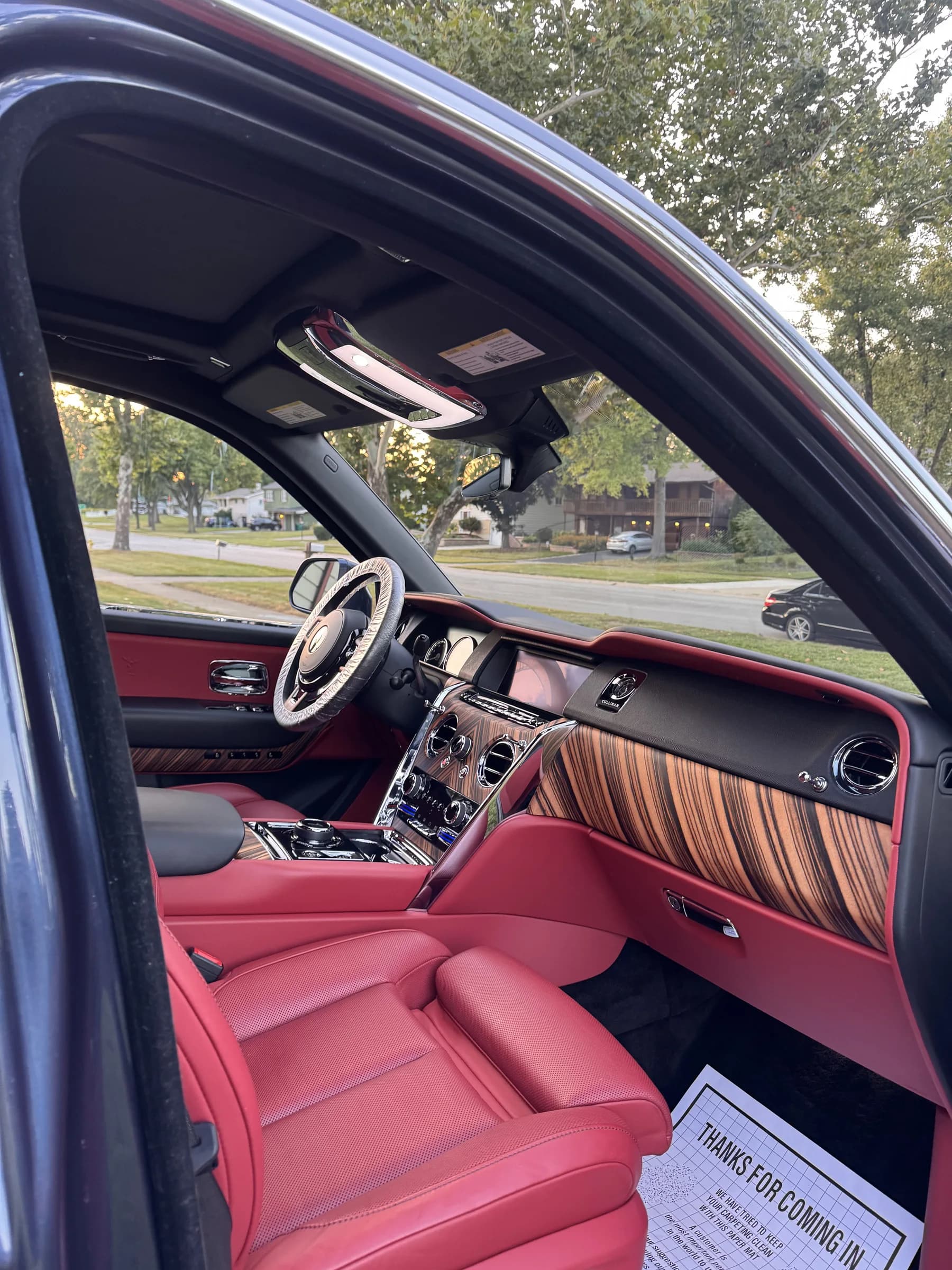 Rolls-Royce Cullinan interior with red leather after an interior detail