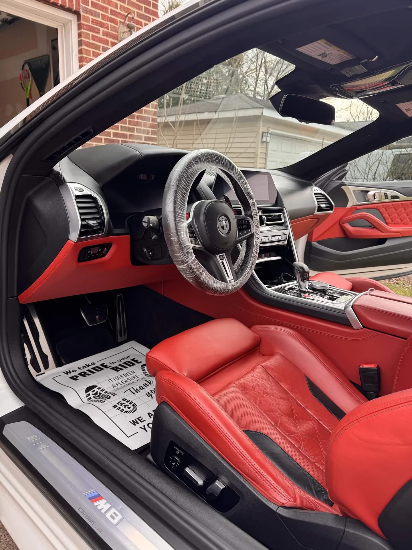 BMW M8 red leather interior after a deep clean and conditioning